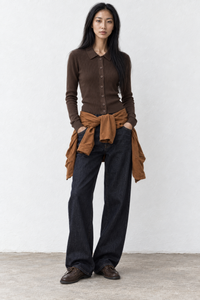 June Park (5'9.5" / 177 cm) wears a size S