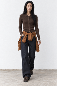 June Park (5'9.5" / 177 cm) wears a size S