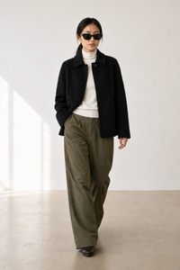 June Park (5'9.5" / 177 cm) wears a size S
