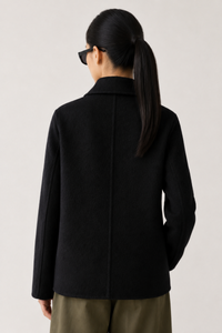 June Park (5'9.5" / 177 cm) wears a size S
