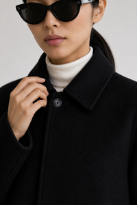 June Park (5'9.5" / 177 cm) wears a size S