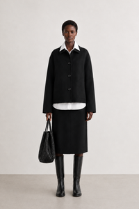 Simone Carter (5'10.5" / 179 cm) wears a size S
