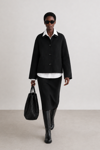 Simone Carter (5'10.5" / 179 cm) wears a size S