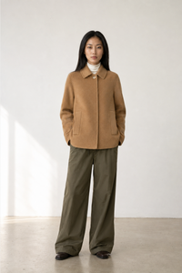 June Park (5'9.5" / 177 cm) wears a size S