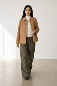 June Park (5'9.5" / 177 cm) wears a size S