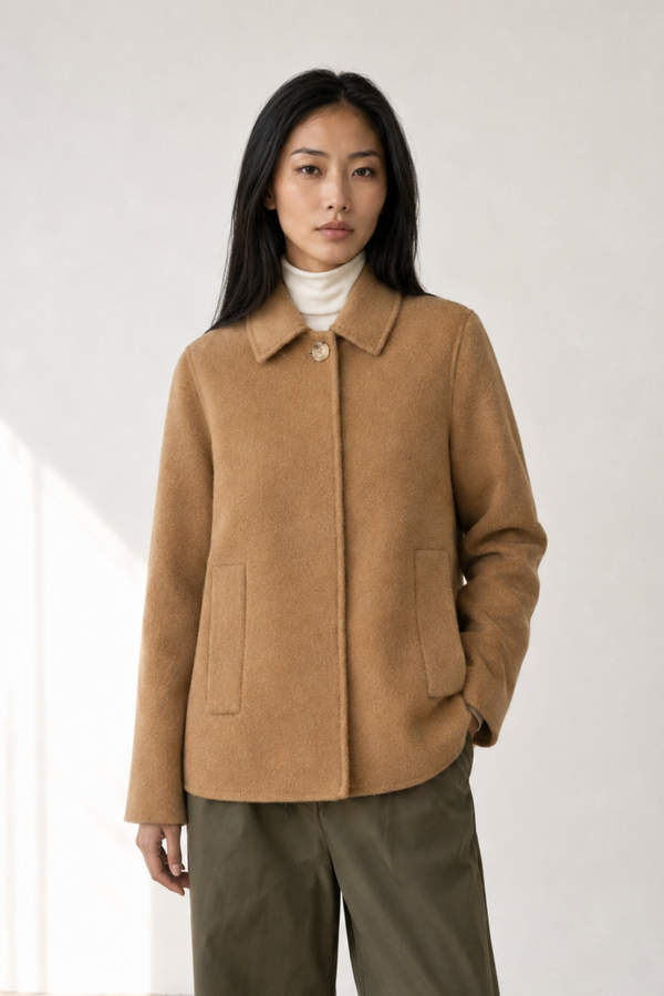 June Park (5'9.5" / 177 cm) wears a size S
