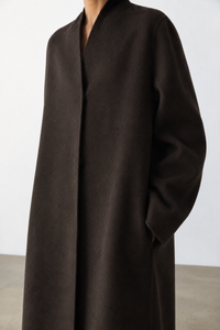 Mara Costa (5'9.5" / 177 cm) wears a size S
