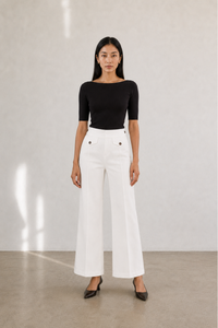 June Park (5'9.5" / 177 cm) wears a size S