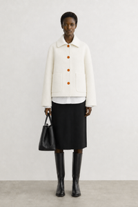 Simone Carter (5'10.5" / 179 cm) wears a size S