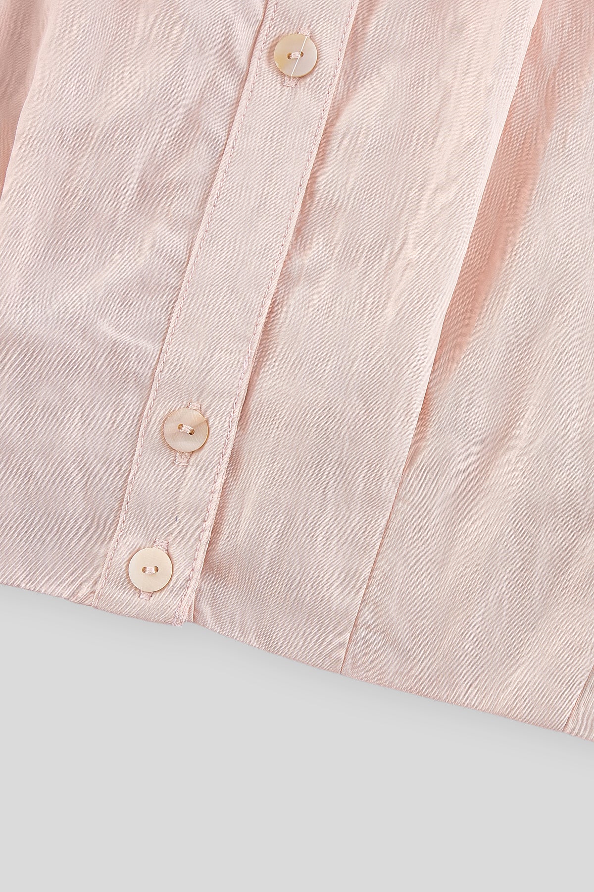 Buttoned cropped shirt