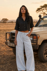 Priya (5'8" / 173 cm) wears a size S