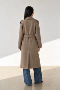 June Park (5'9.5" / 177 cm) wears a size S