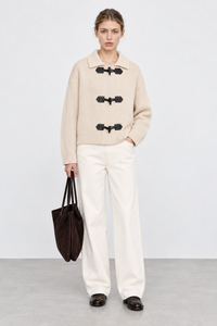 Ingrid Larsen (5'10" / 178 cm) wears a size S