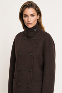 Elena Rossi (5'11" / 180 cm) wears a size S