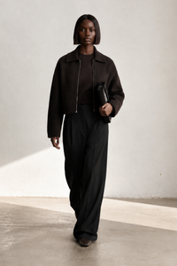 Simone Carter (5'10.5" / 179 cm) wears a size S