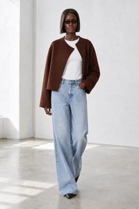Simone Carter (5'10.5" / 179 cm) wears a size S