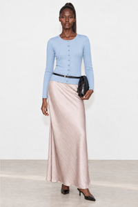Simone Carter (5'10.5" / 179 cm) wears a size S